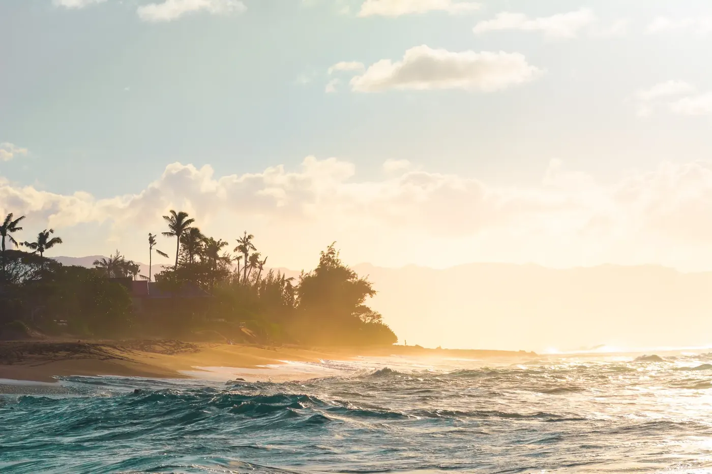 Warm morning light over an island coastline