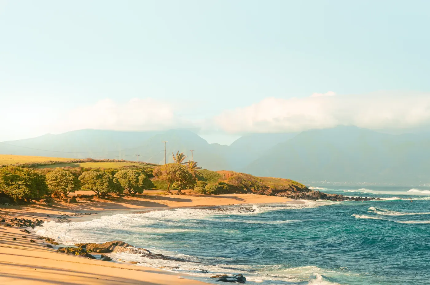 A bright tropical coastline and blue ocean