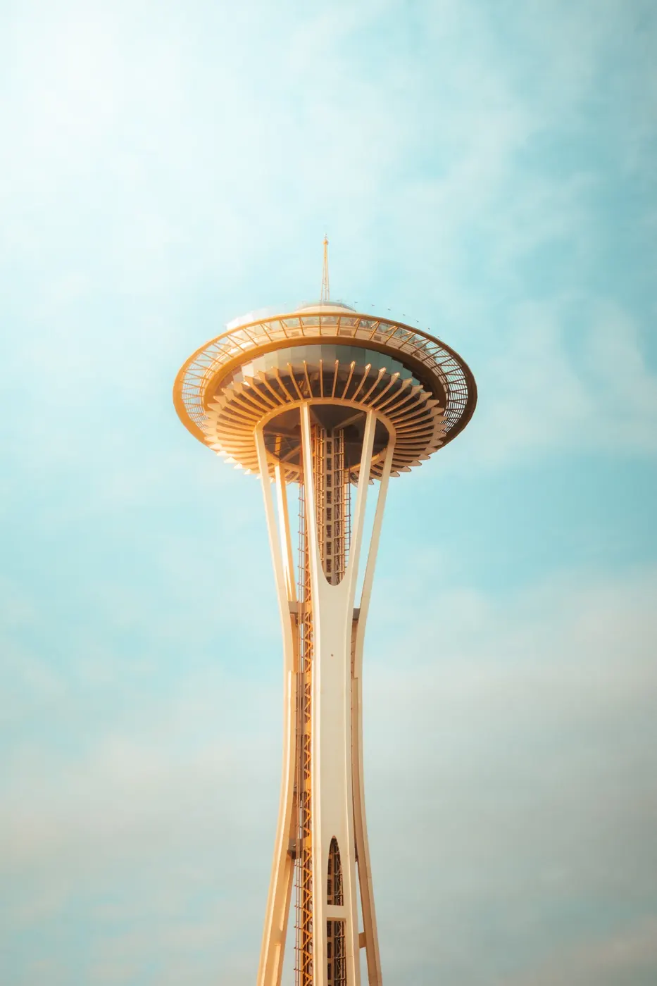 The Space Needle isolated against a pale blue sky